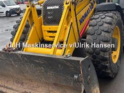 Komatsu WB97 S PÅ VEJ IND